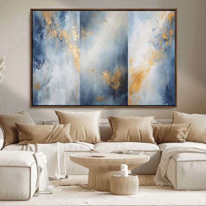 Abstract canvas art in soft blue and gold tones with textured brushstrokes, ideal for elegant or modern neutral decor spaces.