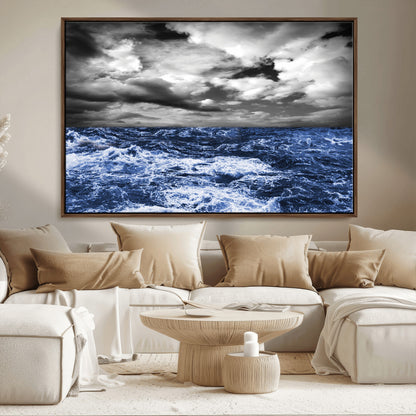 Moody canvas wall art of a stormy ocean under a dramatic black-and-white sky, perfect for bold or coastal-style interiors.