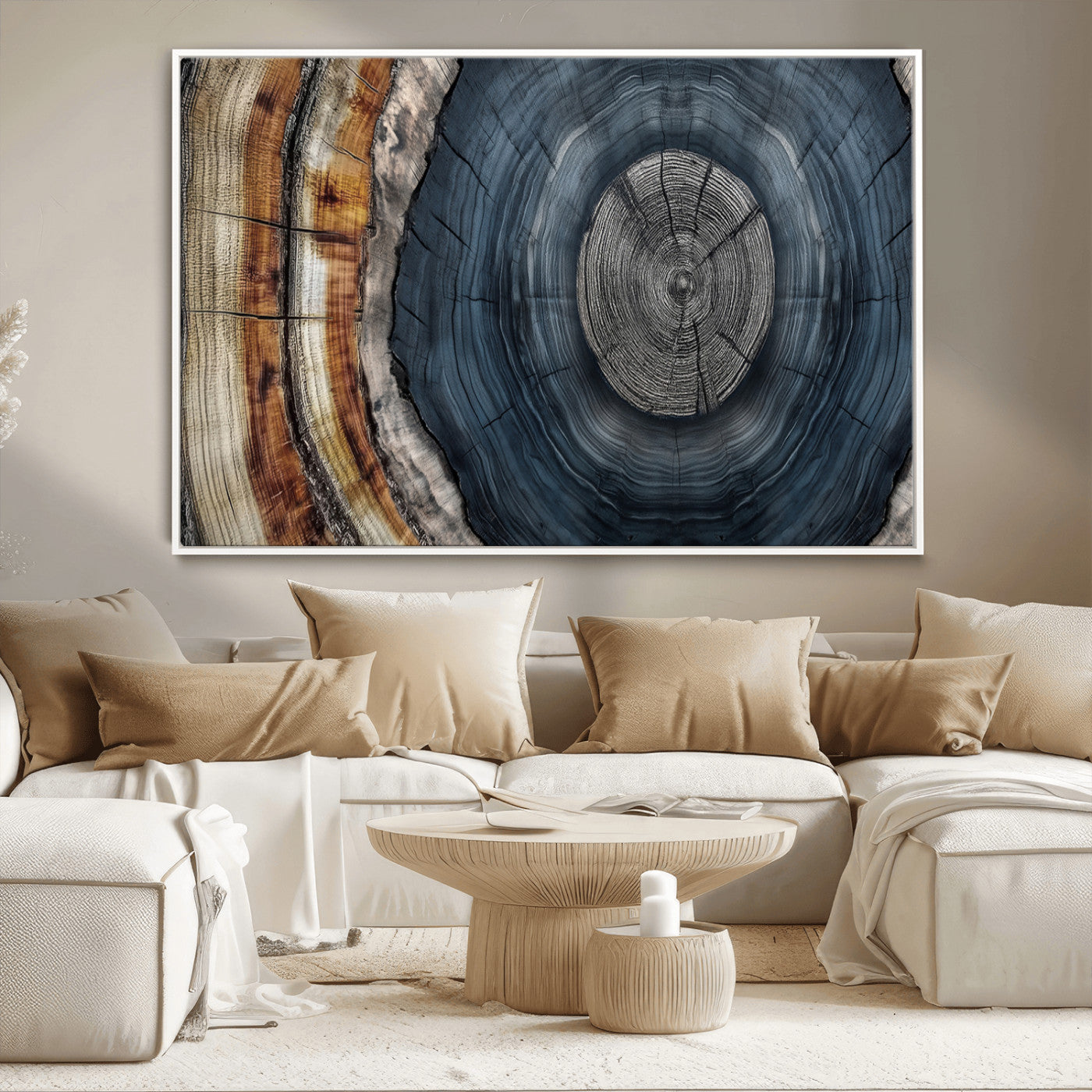 A stunning close-up of a tree trunk showing the intricate, circular growth rings, showcasing the natural textures and rich contrasts in deep blues, browns, and silvers.