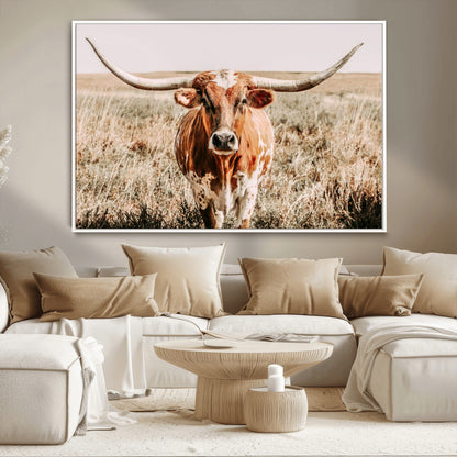 Framed longhorn cow canvas wall art with rustic prairie background, western animal print perfect for farmhouse or ranch style decor