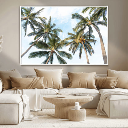Framed canvas of tall palm trees reaching into a tropical sky, ideal for beach home or relaxed island-inspired wall decor.
