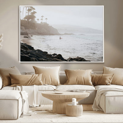 Framed canvas of a surfer in misty coastal tones at a foggy California beach, ideal for minimalist coastal beach or serene ocean-themed decor.