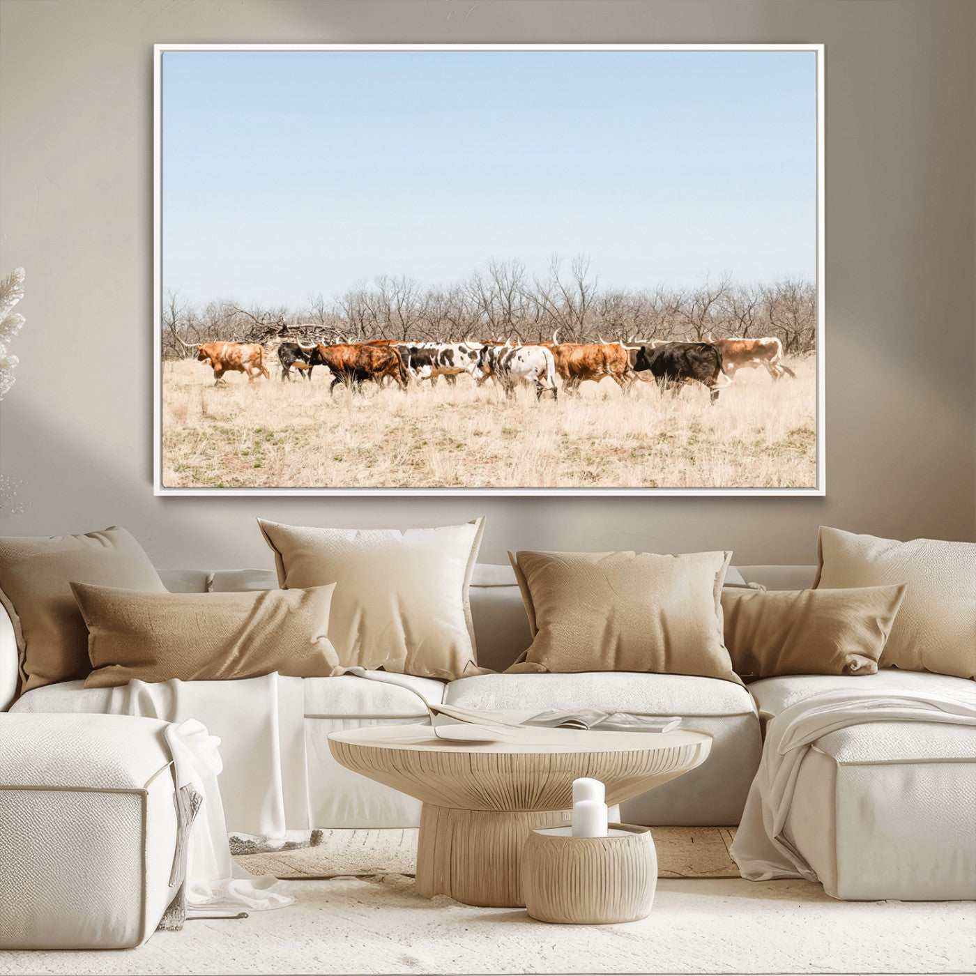 Framed wall art of Texas longhorn cattle walking through a dry, neutral-toned prairie, perfect for rustic farmhouse or western-themed home decor.