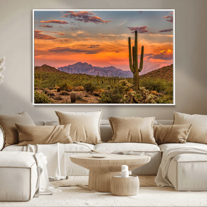 Vibrant desert sunset with saguaro cacti and distant mountains, perfect for Southwestern or warm-toned home decor.