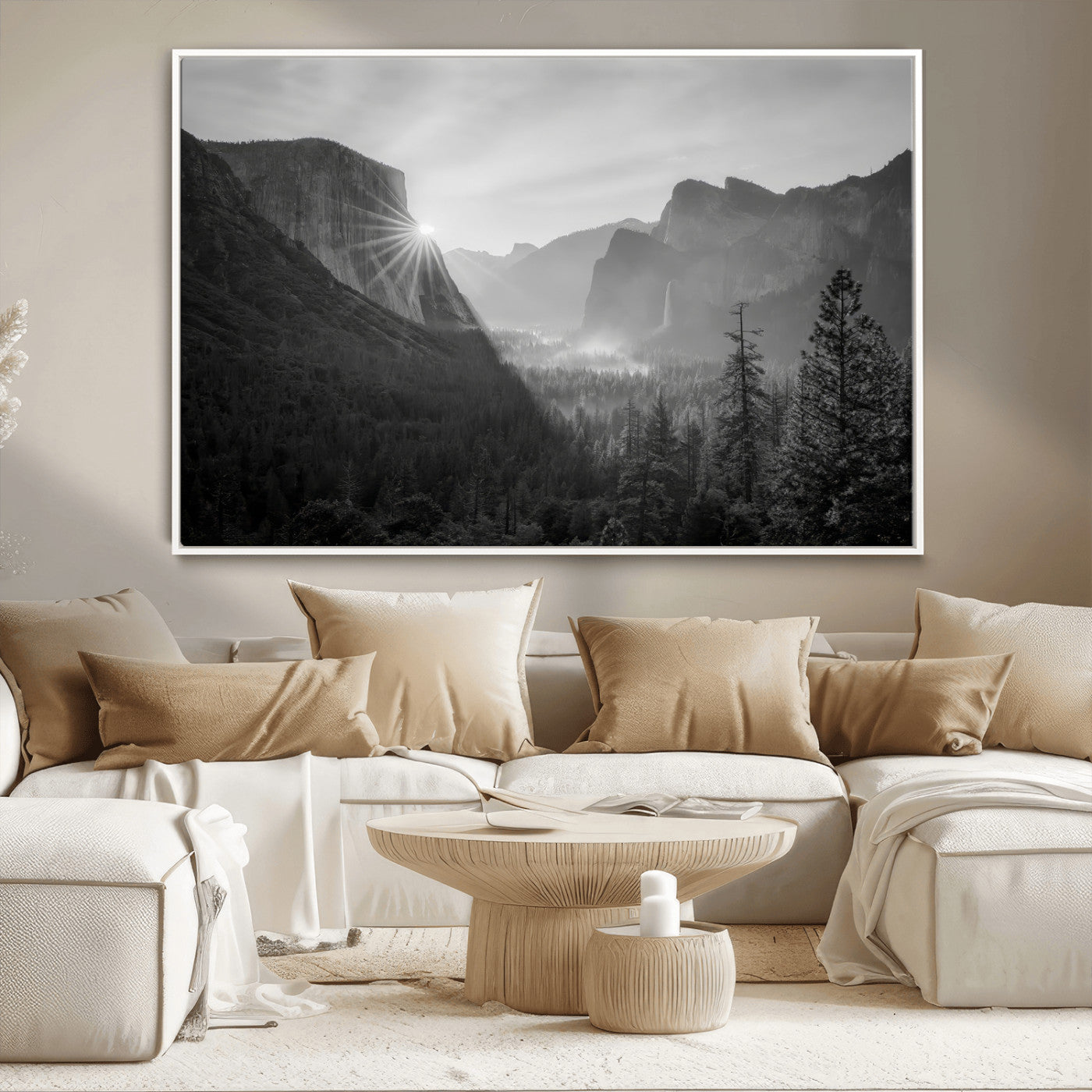 Black and white landscape of Yosemite with sun rays peeking over El Capitan, ideal for moody nature or modern rustic decor.