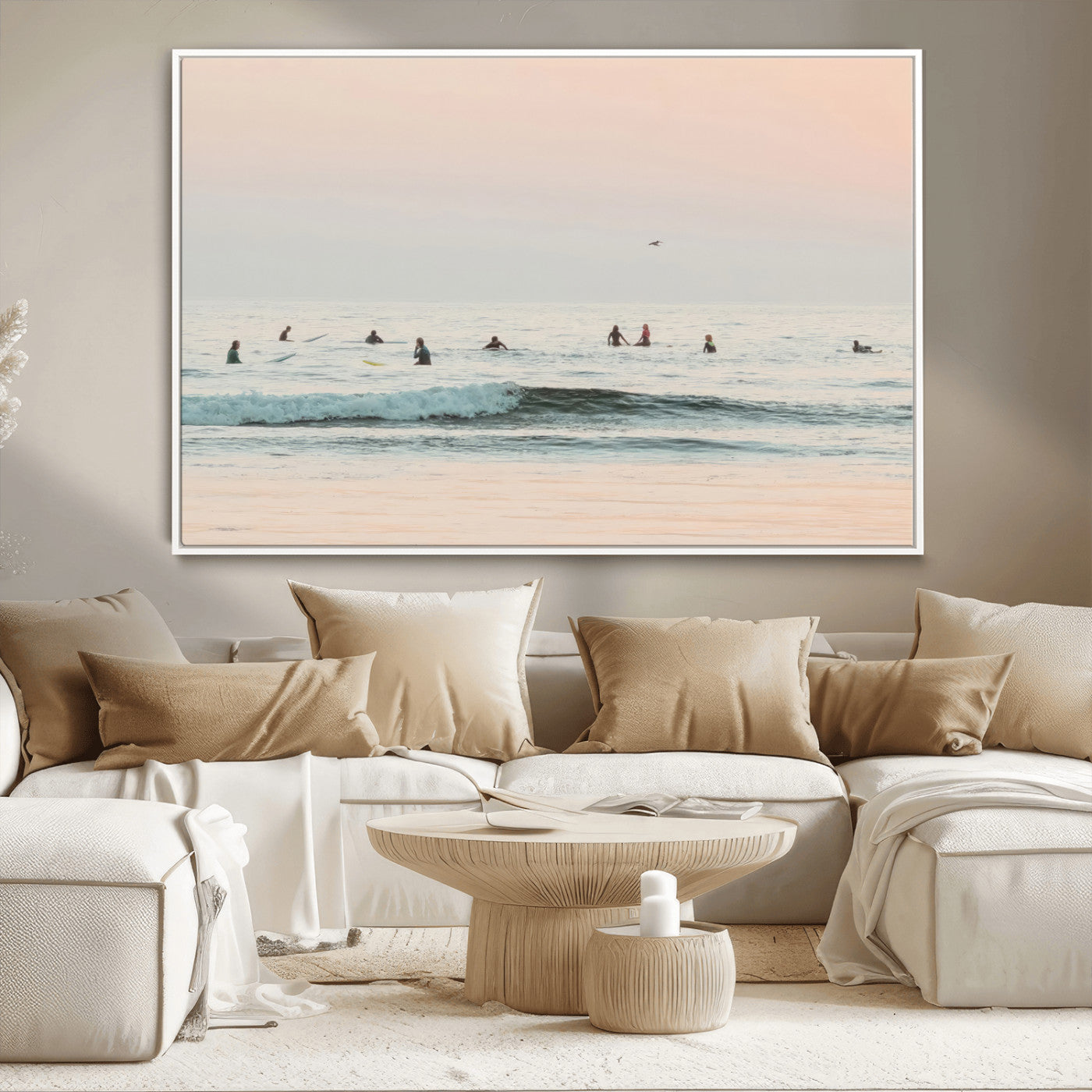 Dreamy photo of surfers waiting on soft pastel waves under a pink sunset sky, ideal for soft coastal minimalist or serene ocean-themed home decor.