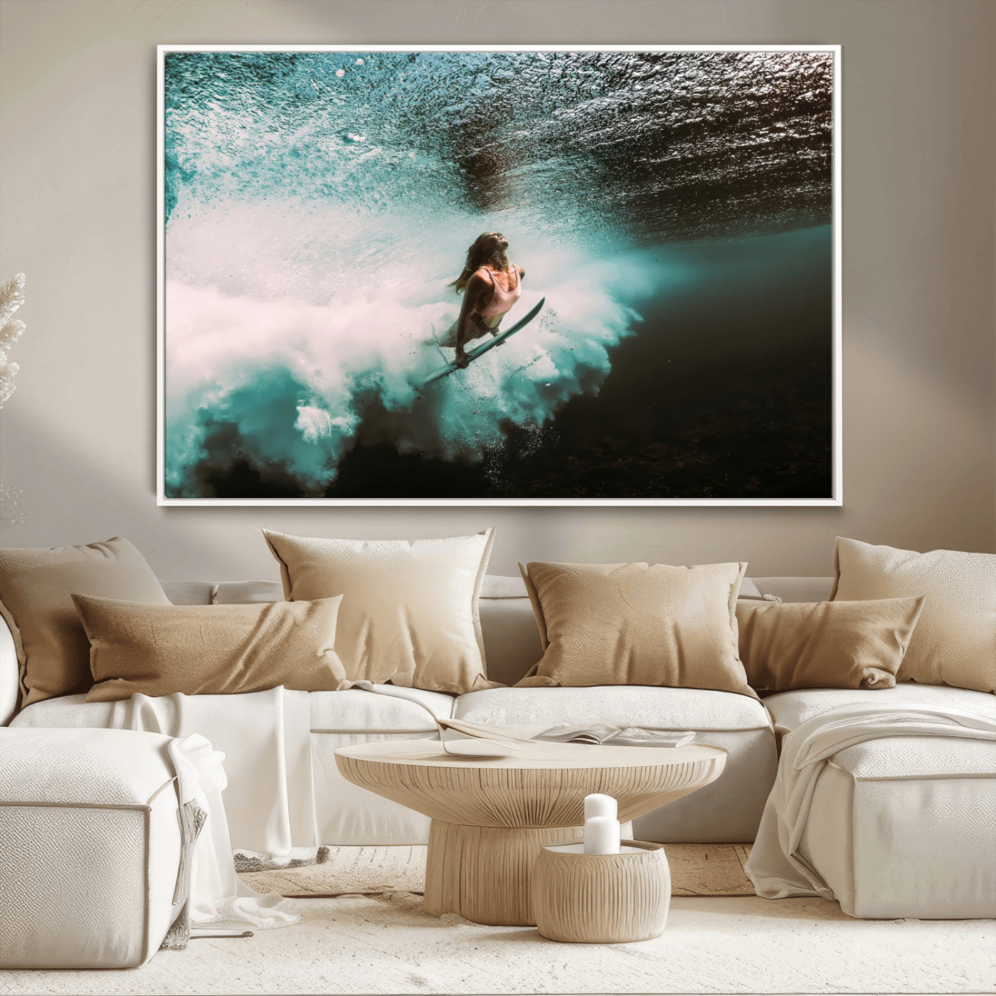 Vibrant underwater photo of a female surfer diving through turquoise waves, perfect for coastal boho or surf-inspired home decor.