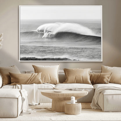 A dramatic black and white ocean wave crashing with immense force, capturing the raw power and movement of the sea in a bold seascape.