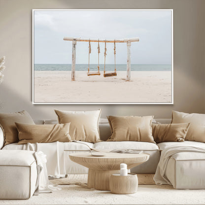 A rustic wooden beach swing stands on a serene sandy shore with an ocean horizon in the background, creating a tranquil and dreamy coastal escape.