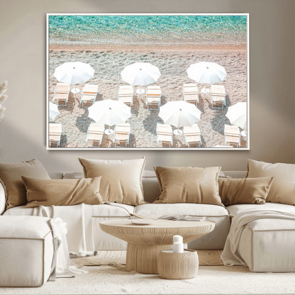 A bright beach scene with white umbrellas, pastel sand, and turquoise waters, creating a tranquil coastal vibe, perfect for beach house or summer decor.
