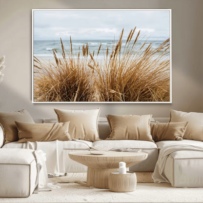 Canvas of golden beach grass swaying by the ocean under a soft cloudy sky, perfect for neutral-toned or coastal minimalist decor.
