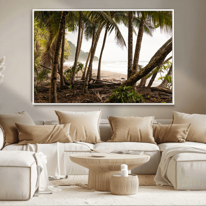 Dense tropical palm trees framing a sandy beach and ocean shore, ideal for jungle or coastal themed interior wall decor.