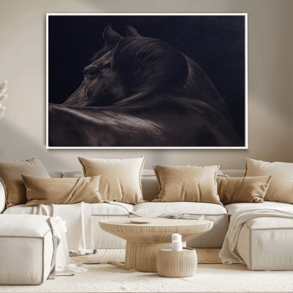 Close-up of a black horse with dramatic lighting on a dark background, perfect for rustic or masculine home decor.