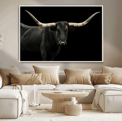 Close-up of a black Texas longhorn with large curved horns on black background, ideal for rustic farmhouse or modern western interiors.