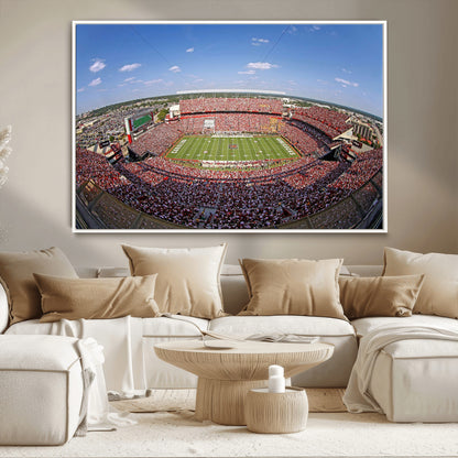 An William Brice-Stadium view of a full football stadium with cheering fans and clear blue skies, capturing the excitement and energy of the game.
