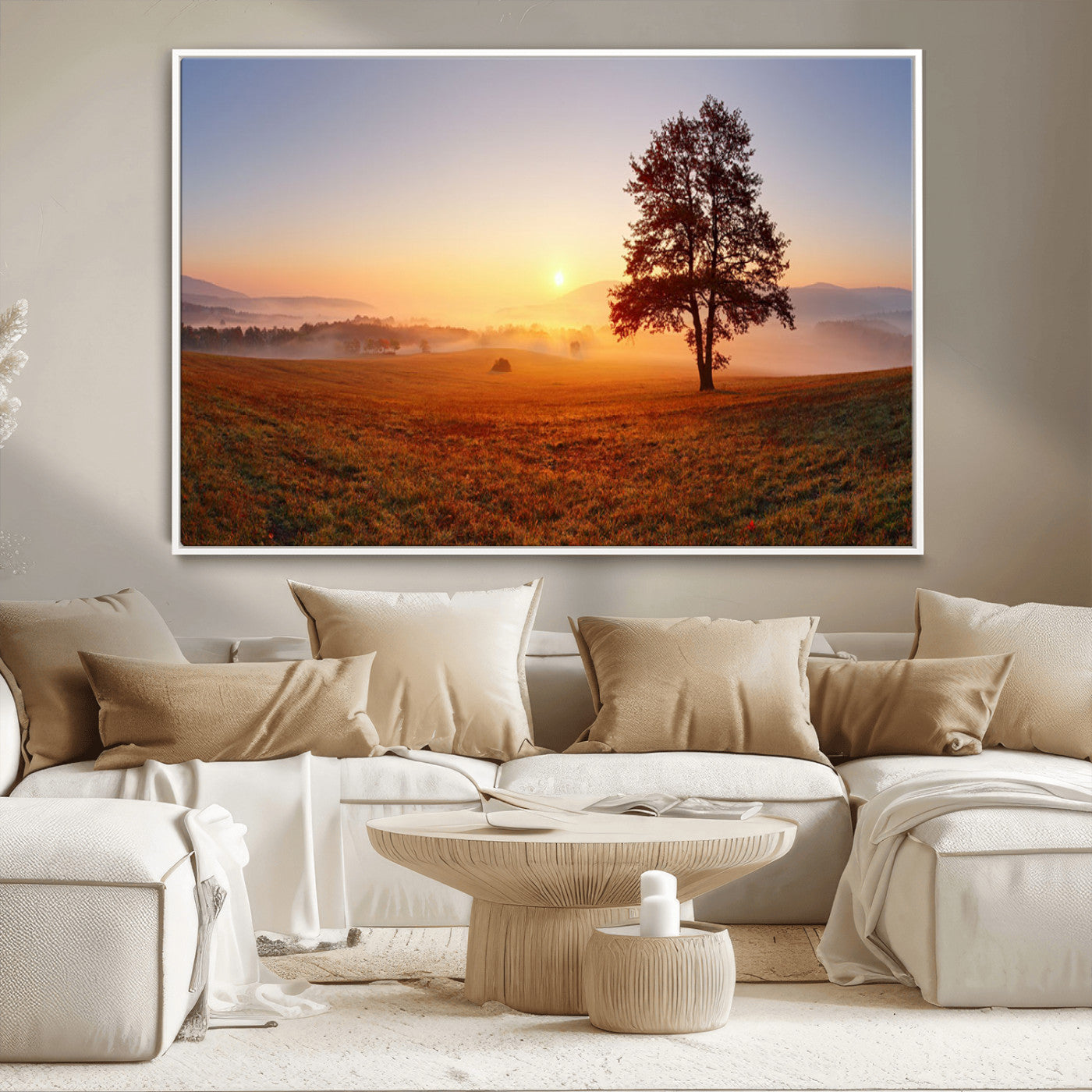 A tranquil landscape at sunrise with a mist-covered field and a lone tree, creating a peaceful and natural atmosphere.