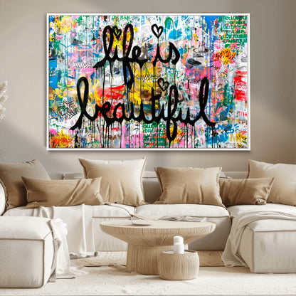 Colorful urban-style canvas with graffiti text “Life is Beautiful” in black paint, ideal for bold or street-themed home decor.