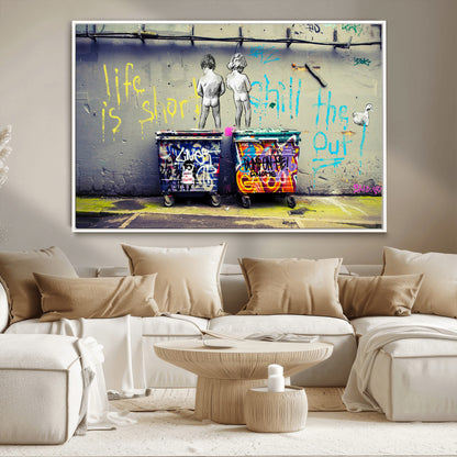 Graffiti-style canvas art with bold text and two naked figures over urban dumpsters, ideal for edgy or street-style decor.