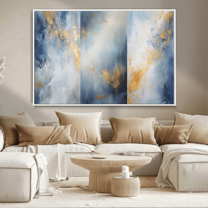 Abstract canvas art in soft blue and gold tones with textured brushstrokes, ideal for elegant or modern neutral decor spaces.