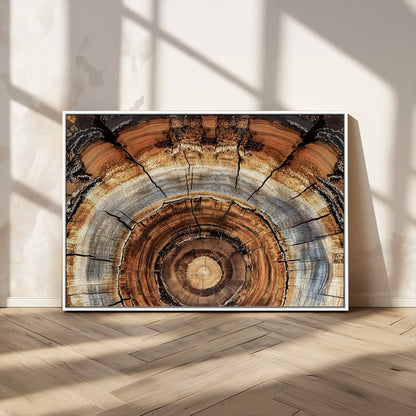 Canvas of tree rings and natural wood grain in earthy tones, ideal for rustic or vintage-inspired home decor with organic textures.