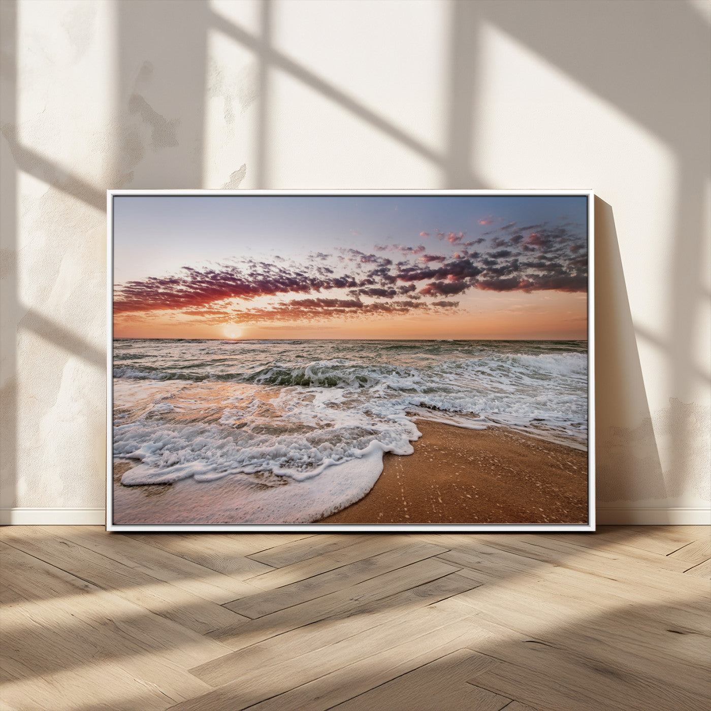Canvas of a sunset over a foamy ocean shore with warm light and gentle waves, ideal for coastal or beach-themed home decor.