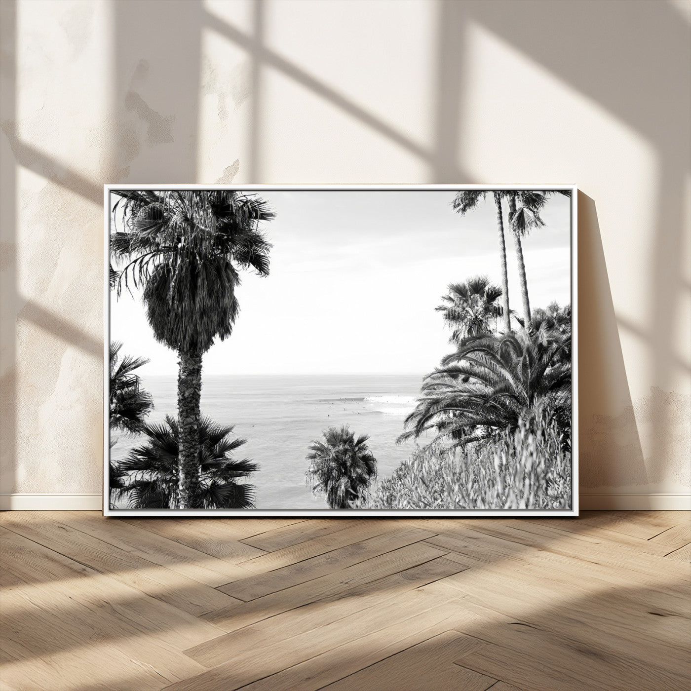Monochrome canvas of palm trees framing a coastal surf scene, perfect for California-inspired or retro black-and-white beach decor.