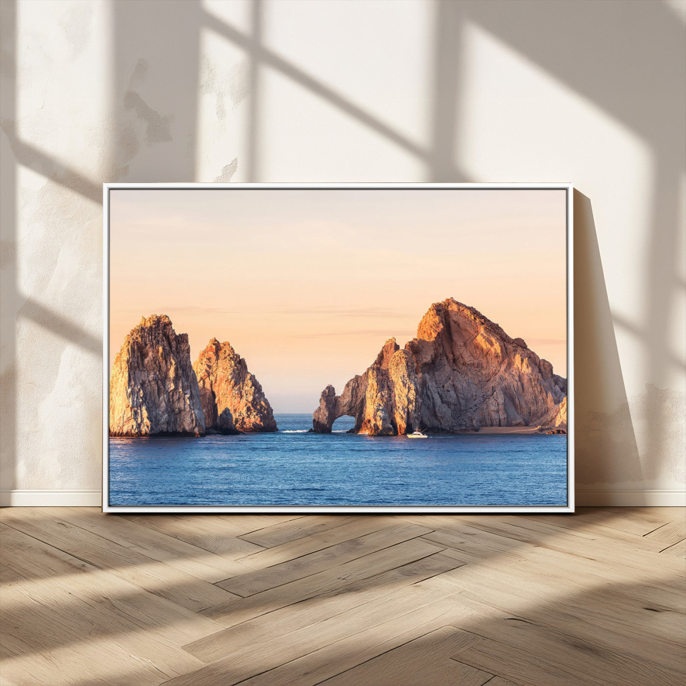 Framed canvas of El Arco rock formation in Cabo San Lucas at golden hour, ideal for coastal landmark or ocean-inspired decor.
