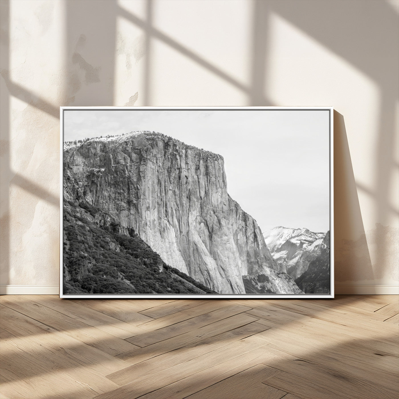 Monochrome canvas of El Capitan’s granite wall in Yosemite with snowy peaks, ideal for dramatic mountain or black-and-white nature decor.