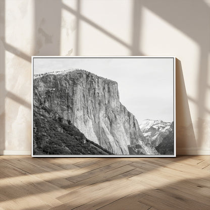 Monochrome canvas of El Capitan’s granite wall in Yosemite with snowy peaks, ideal for dramatic mountain or black-and-white nature decor.