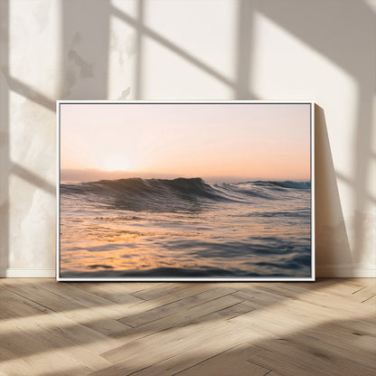 Framed canvas of ocean waves glowing in sunset light, ideal for golden hour calm or peaceful coastal-inspired wall decor.