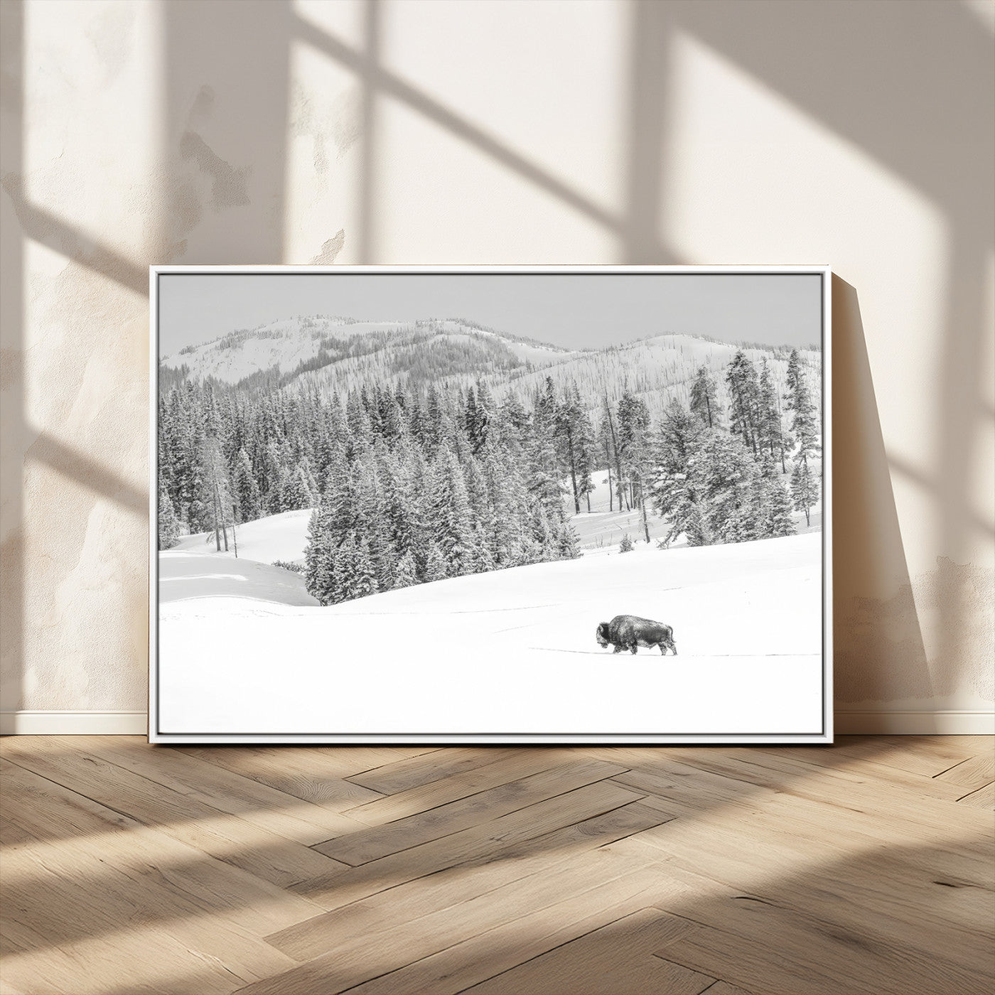 Snowy bison walking through white forest landscape, ideal for monochrome winter or wilderness-style interior wall decoration.