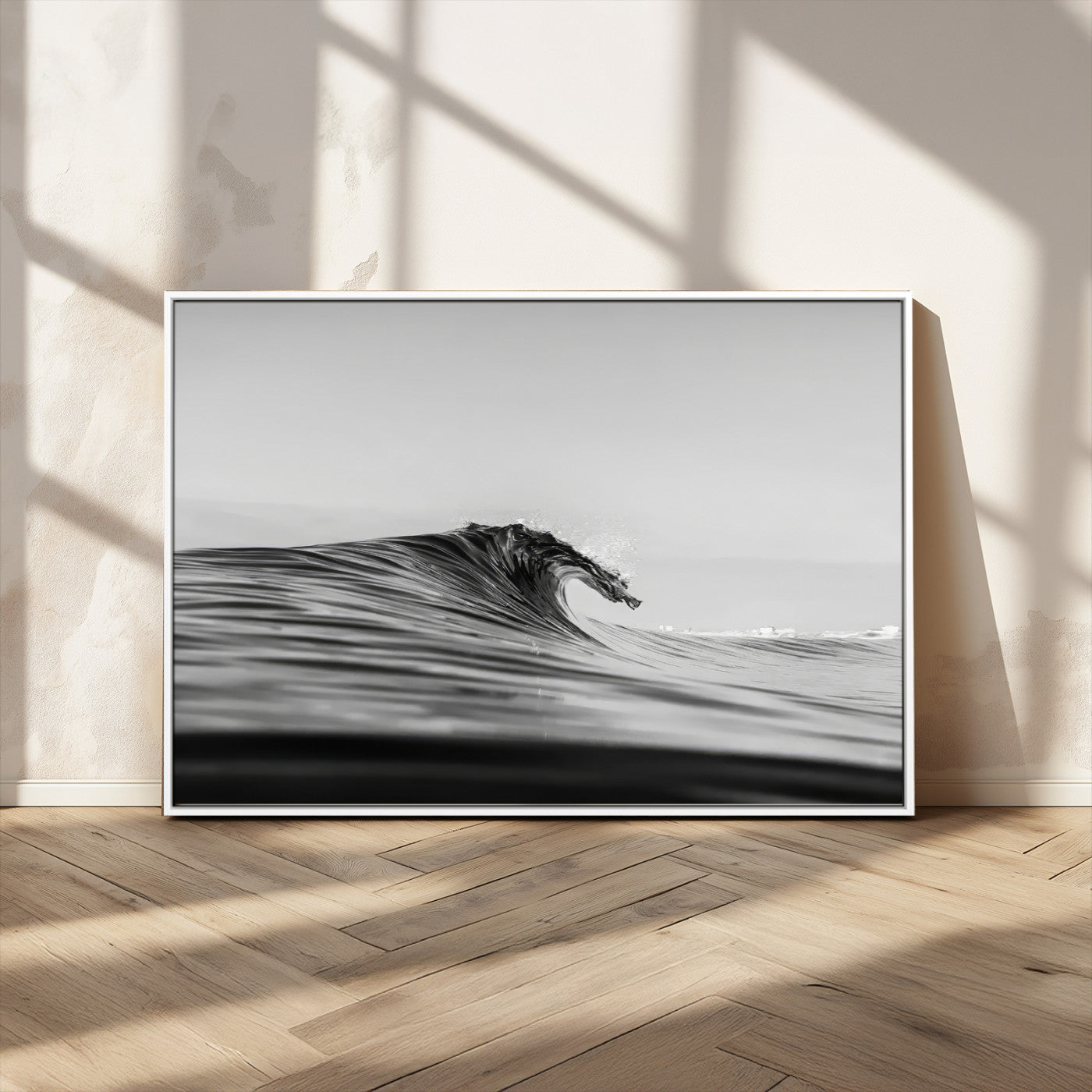 Striking black and white photo of a curling wave, ideal for modern coastal or minimalist wall decor settings.