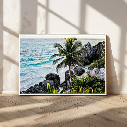 Framed canvas of a vibrant tropical coastline with palm trees, rocky cliffs, and turquoise waters, ideal for tropical coastal home decor.