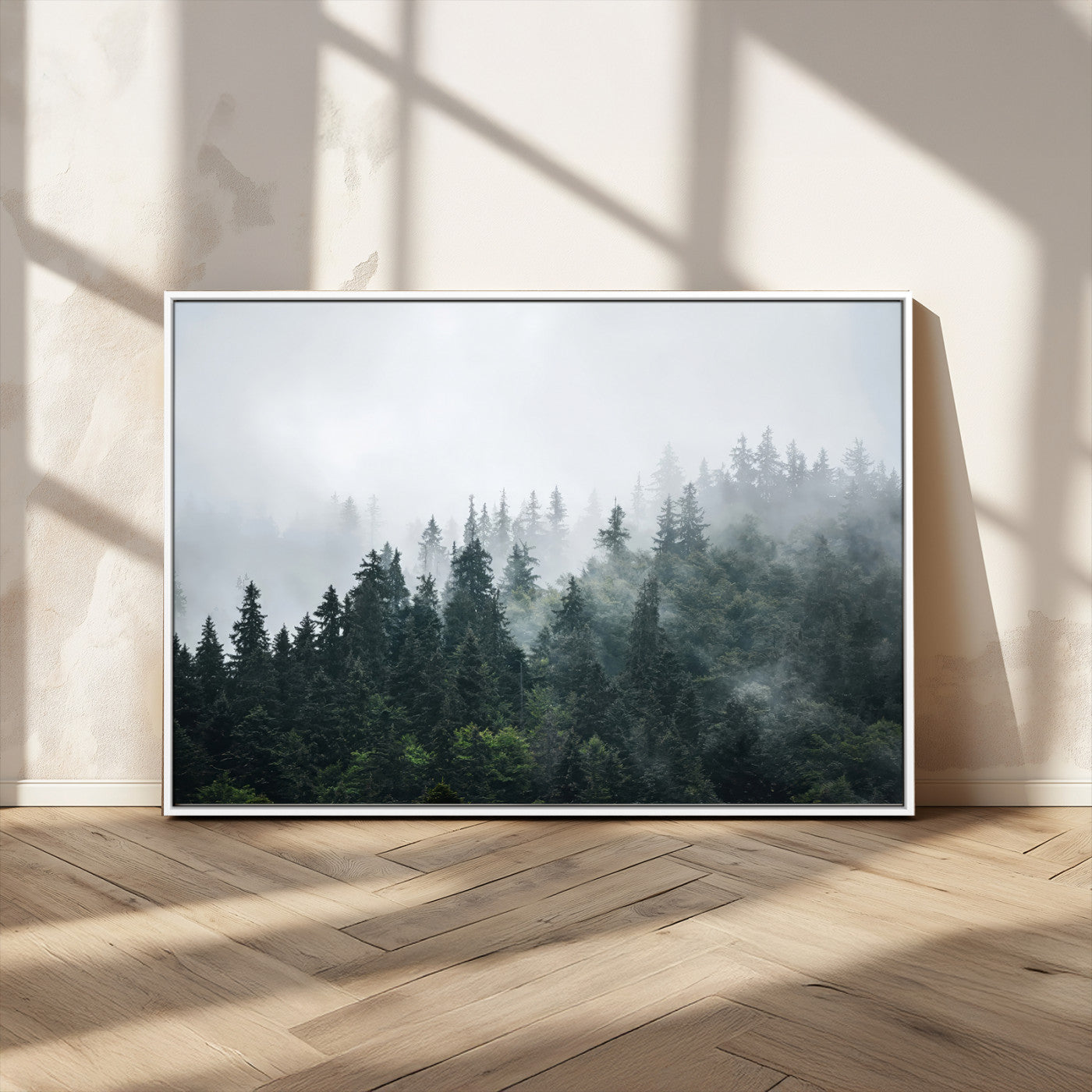 A misty evergreen forest shrouded in soft fog, creating a tranquil and moody landscape with lush green trees fading into the distance.