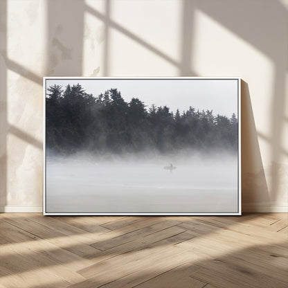 A lone surfer carrying a board through a misty shoreline, surrounded by dense trees and fog, creating a peaceful and mysterious coastal scene.