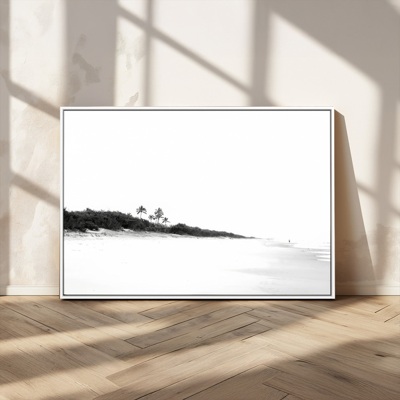 A black and white minimalist coastal scene with a vast open beach, distant palm trees, and a lone figure walking along the shoreline, evoking serenity and solitude.