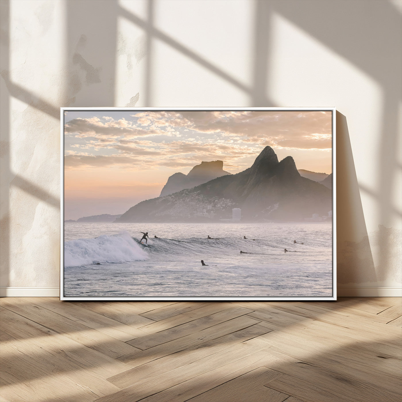 A surfer rides a golden hour wave near misty coastal mountains, surrounded by fellow surfers, capturing the spirit of a coastal adventure.