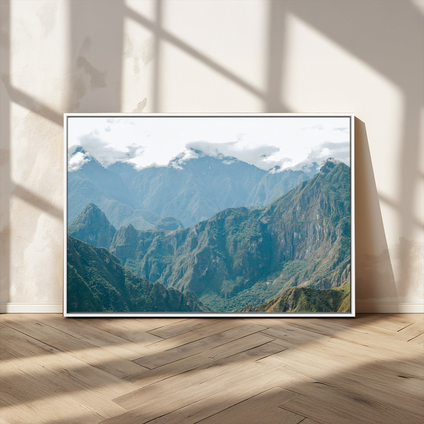 A misty mountain landscape with cloud-covered Andean peaks and lush green valleys, creating a dramatic and serene view, perfect for rustic or nature-inspired home decor.