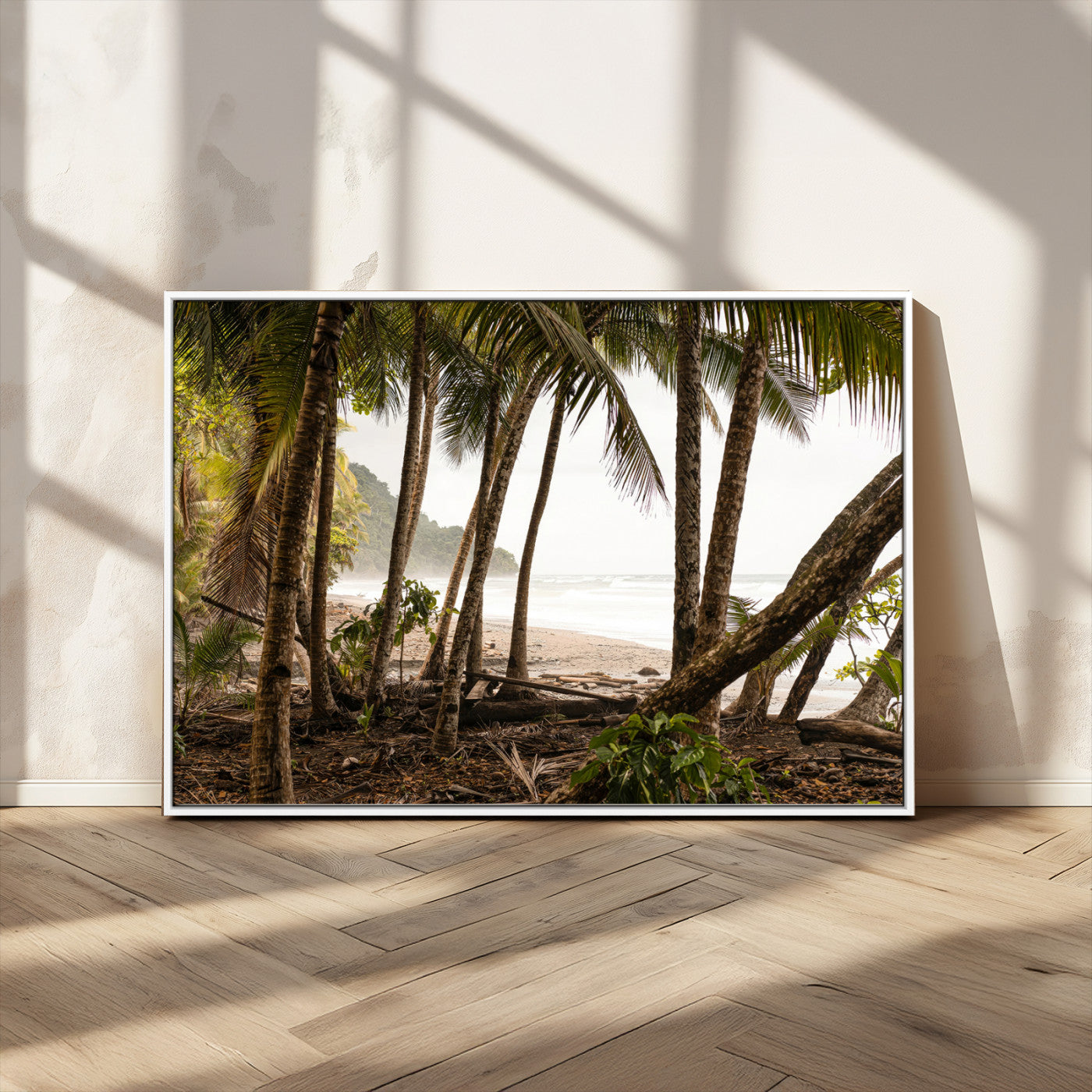 Dense tropical palm trees framing a sandy beach and ocean shore, ideal for jungle or coastal themed interior wall decor.