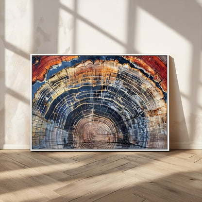 Vibrant tree ring with orange, brown, and blue tones in abstract detail, perfect for rustic or boho-inspired wall decor.