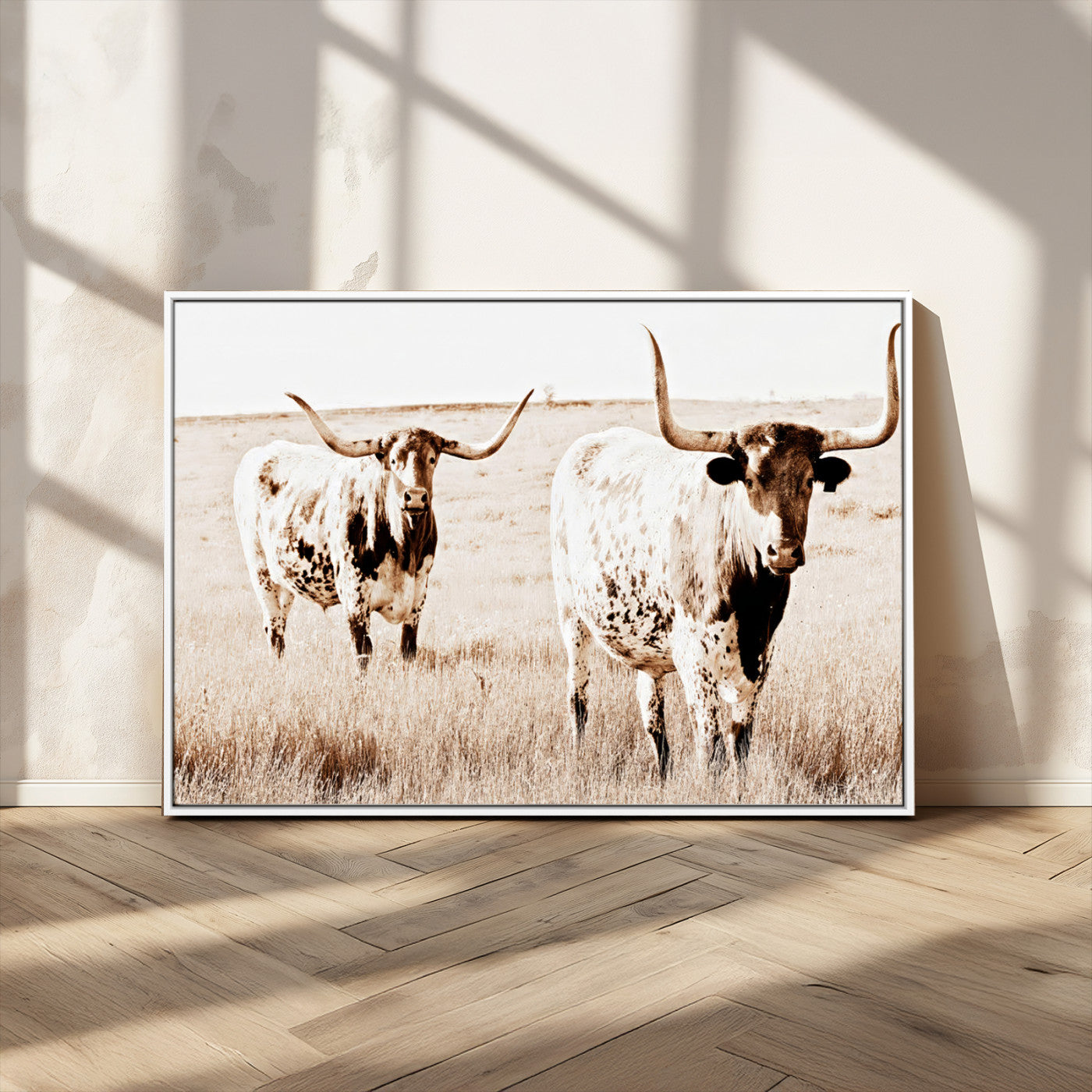 Two Texas longhorn cows standing in a sepia-toned pasture, evoking rustic charm perfect for farmhouse or western country interiors. (