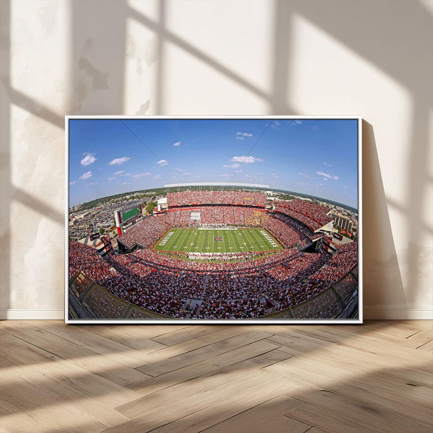 An William Brice-Stadium view of a full football stadium with cheering fans and clear blue skies, capturing the excitement and energy of the game.