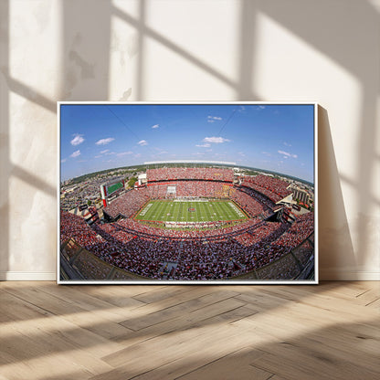 An William Brice-Stadium view of a full football stadium with cheering fans and clear blue skies, capturing the excitement and energy of the game.