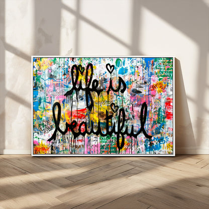 Colorful urban-style canvas with graffiti text “Life is Beautiful” in black paint, ideal for bold or street-themed home decor.