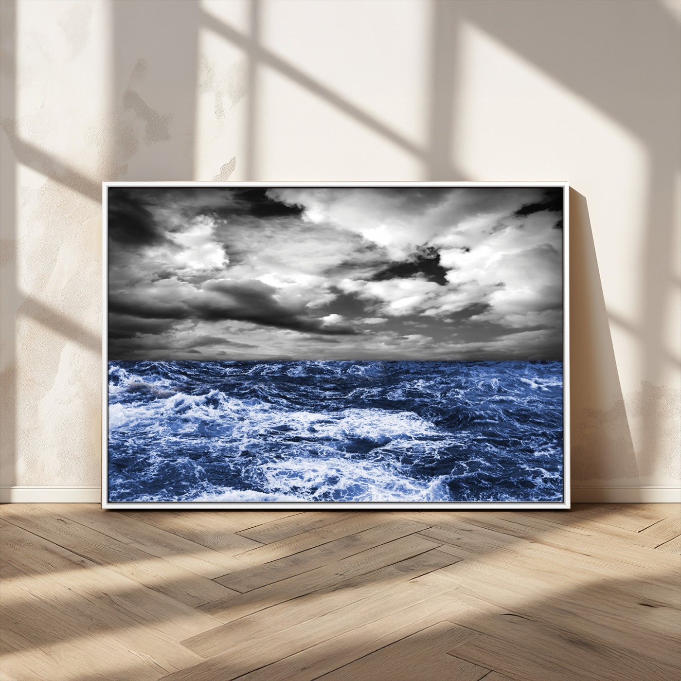 Moody canvas wall art of a stormy ocean under a dramatic black-and-white sky, perfect for bold or coastal-style interiors.