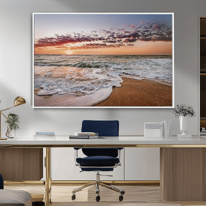 Canvas of a sunset over a foamy ocean shore with warm light and gentle waves, ideal for coastal or beach-themed home decor.