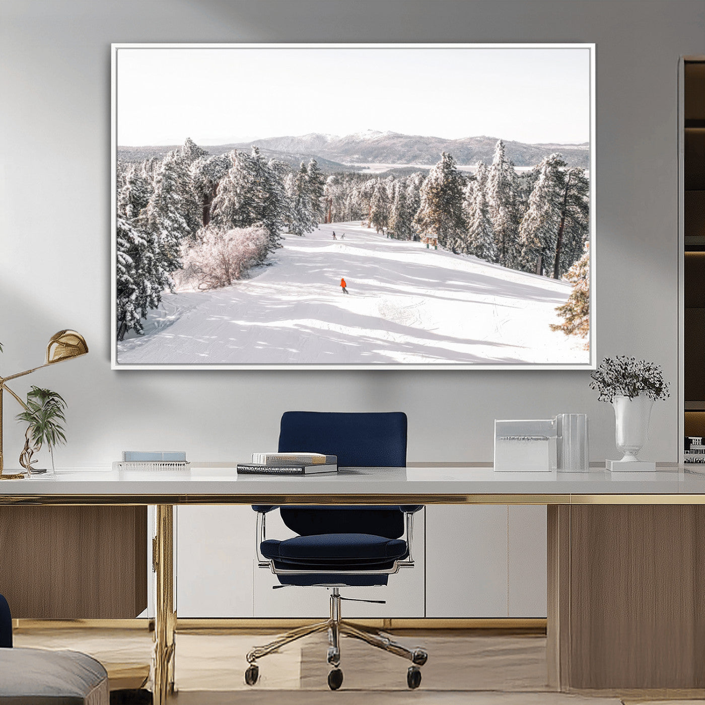 Bright ski trail lined with snow-covered pines and a skier in orange, perfect for alpine adventure or winter sports-inspired decor.