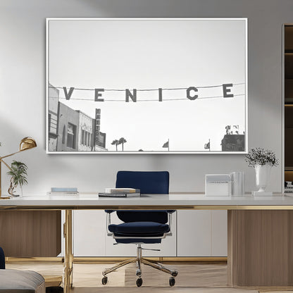 Black and white photo of Venice Beach sign and palm-lined street, perfect for urban coastal or minimalist LA-inspired wall decoration.