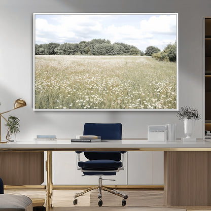 Soft-toned image of a wild daisy field under a cloudy sky, ideal for neutral or Scandinavian-inspired home decor.