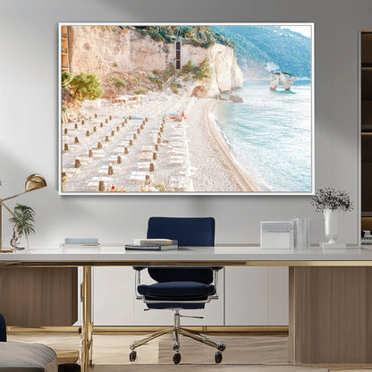 Wall art of a calm Mediterranean beach with rows of sun loungers and umbrellas in soft pastel tones, perfect for light coastal or vacation-themed decor.